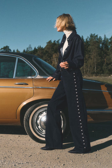 Dark blue studded wide-leg jeans