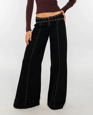 Black studded wide-leg jeans